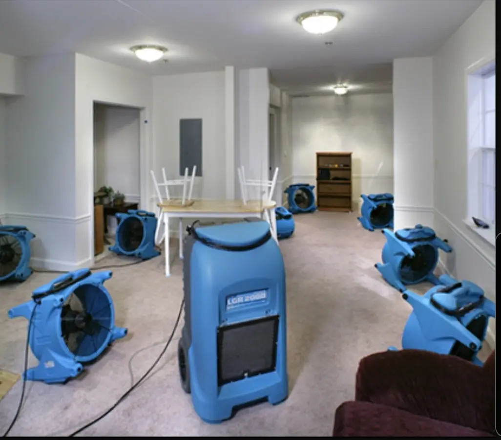 Air movers and dehumidifier setup for Water Damage Restoration in Pearl City